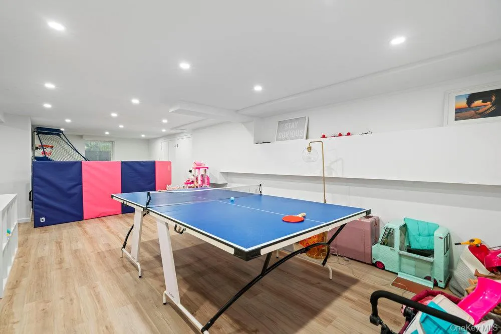 Playroom featuring light wood-style floors and recessed lighting Playroom featuring light wood-style floors and recessed lighting
