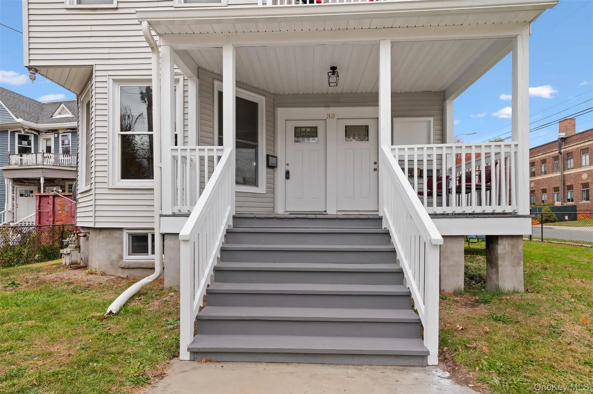 View of exterior entry with a porch View of exterior entry with a porch