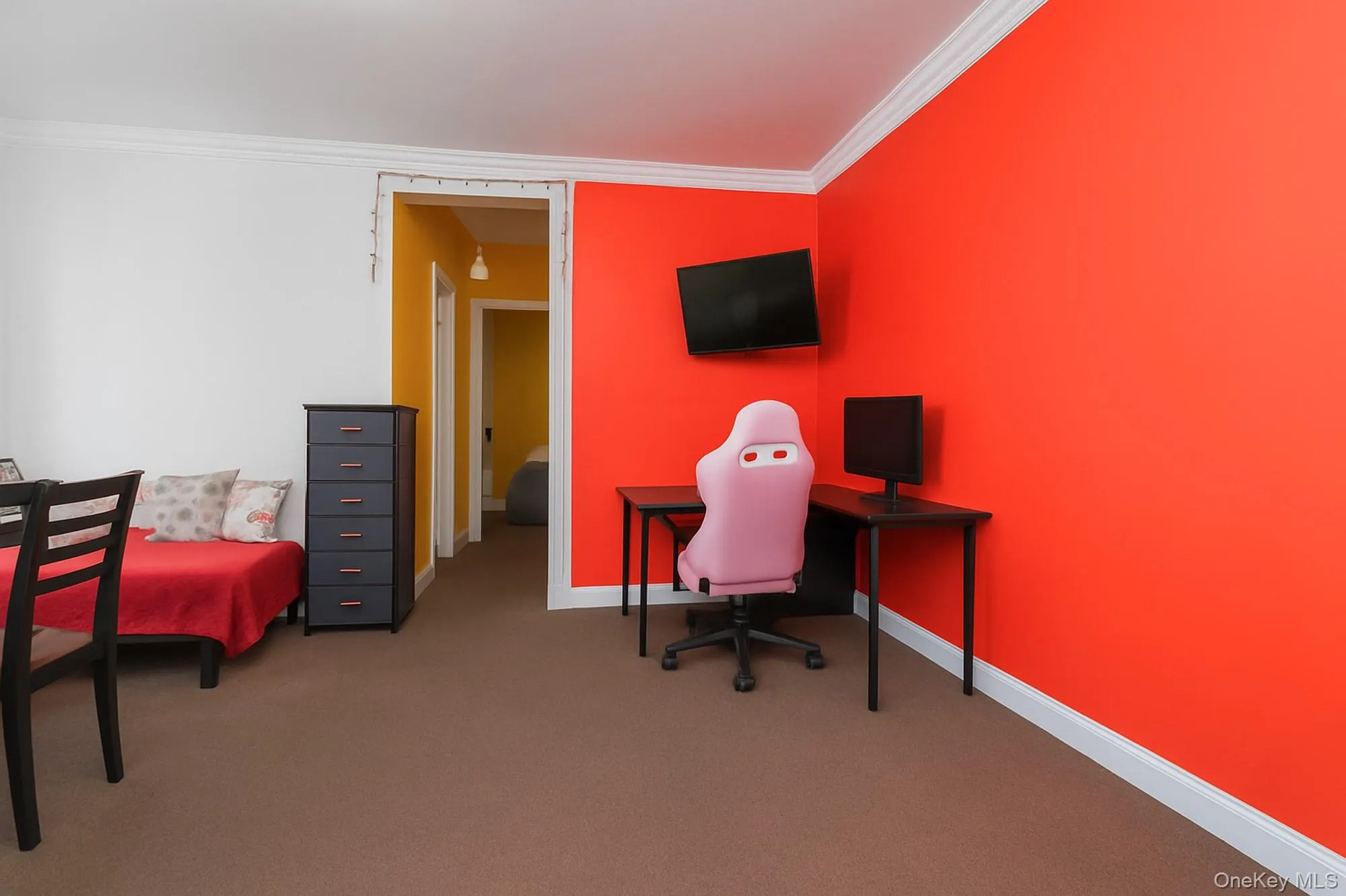 Office with crown molding and carpet floors Office with crown molding and carpet floors