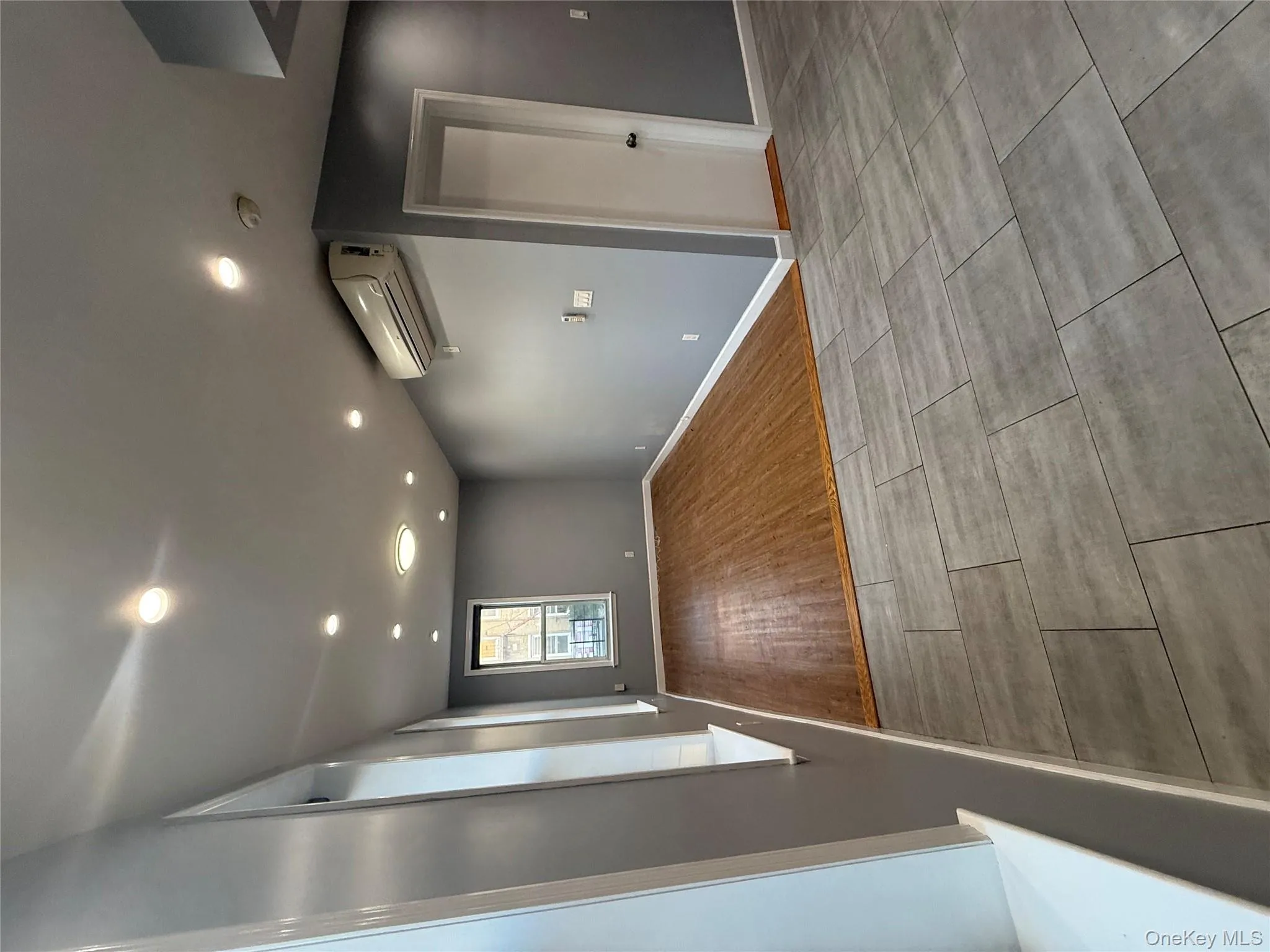 Empty room with recessed lighting and light wood-type flooring Empty room with recessed lighting and light wood-type flooring
