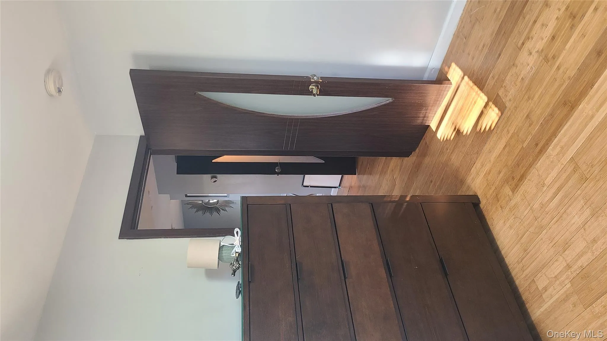 Bedroom with light wood finished floors Bedroom with light wood finished floors