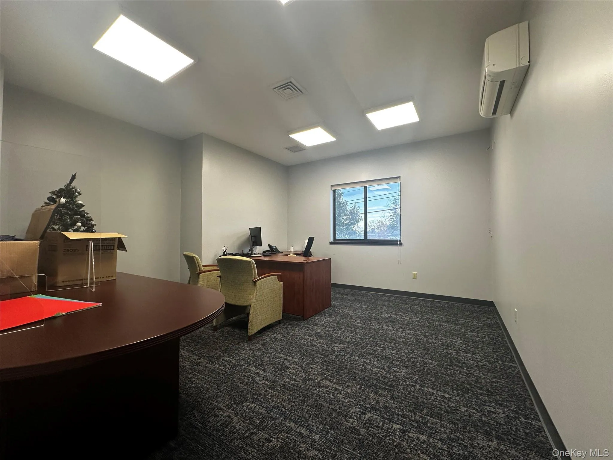 Office featuring a wall mounted air conditioner Office featuring a wall mounted air conditioner