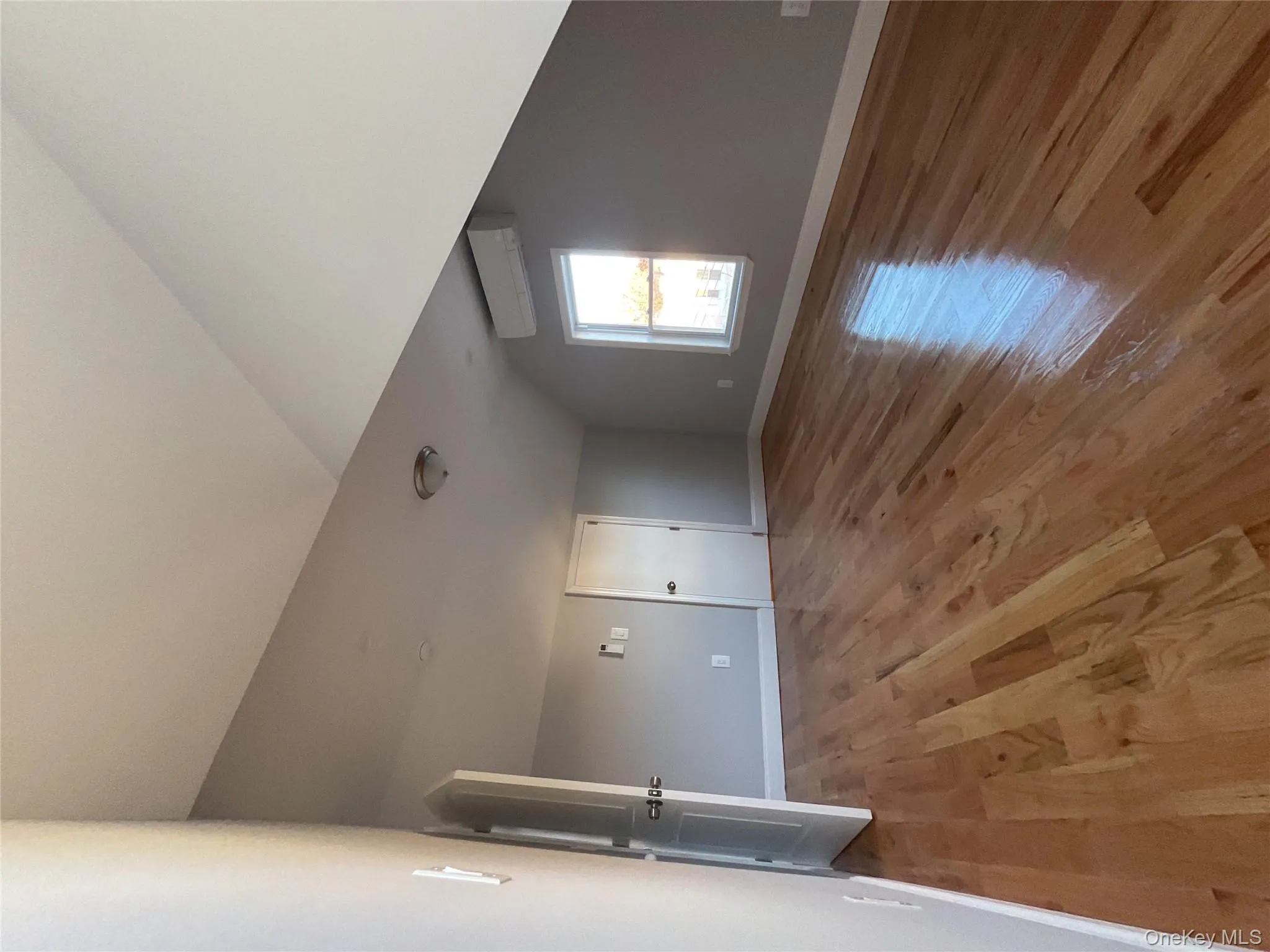 Bonus room featuring light wood-type flooring and lofted ceiling Bonus room featuring light wood-type flooring and lofted ceiling