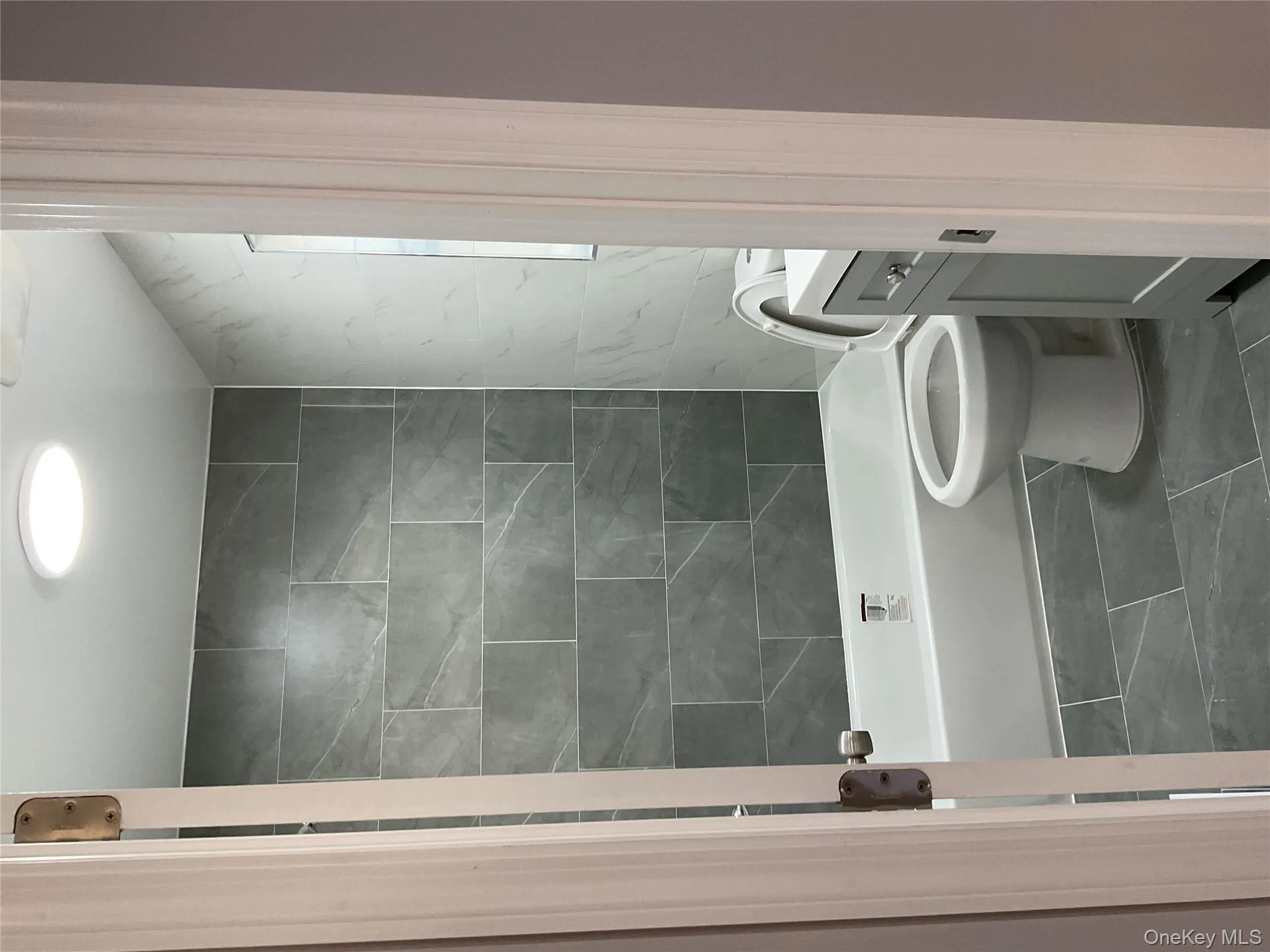 Bathroom with vanity and shower / bathtub combination Bathroom with vanity and shower / bathtub combination