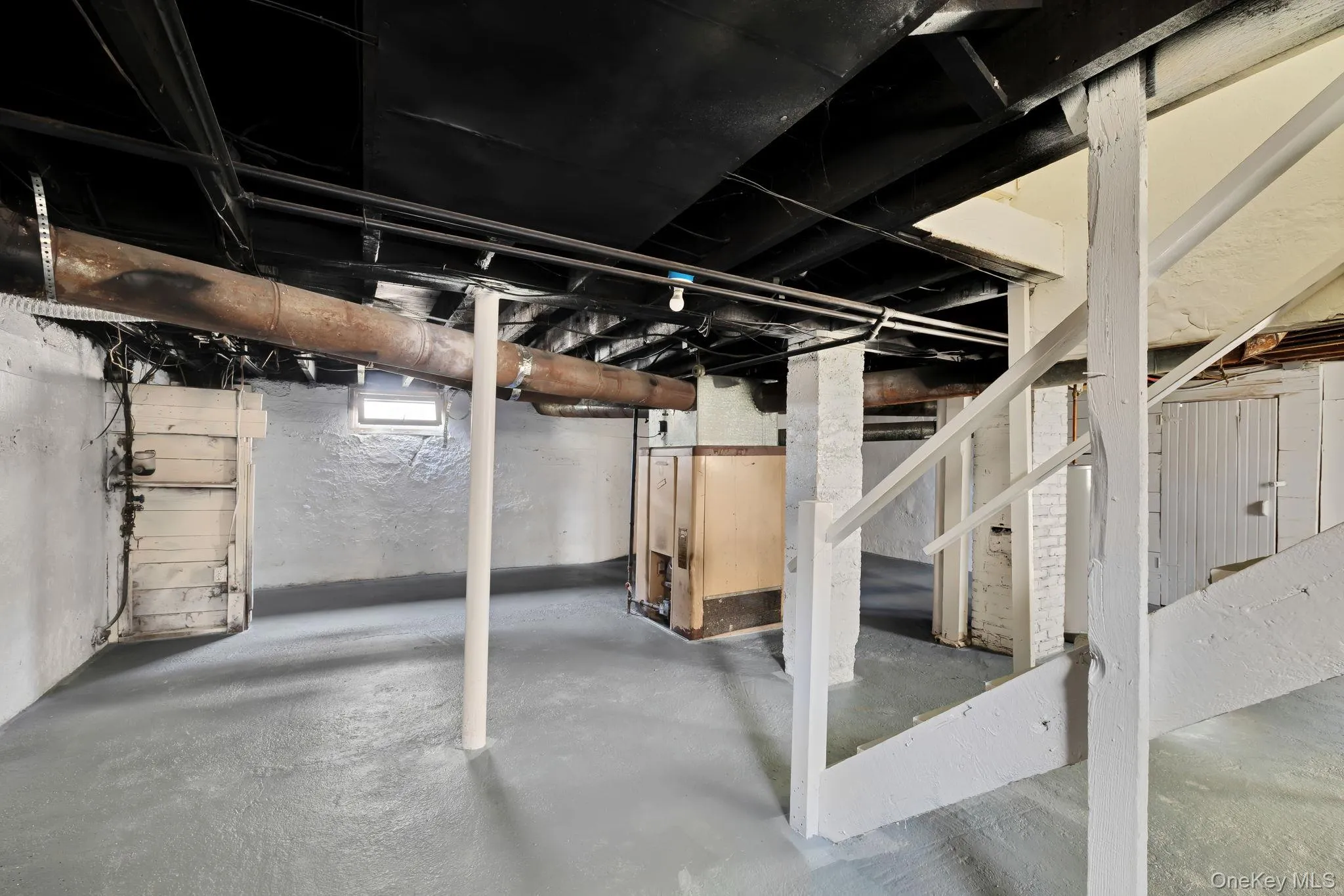 Basement featuring stairway Basement featuring stairway