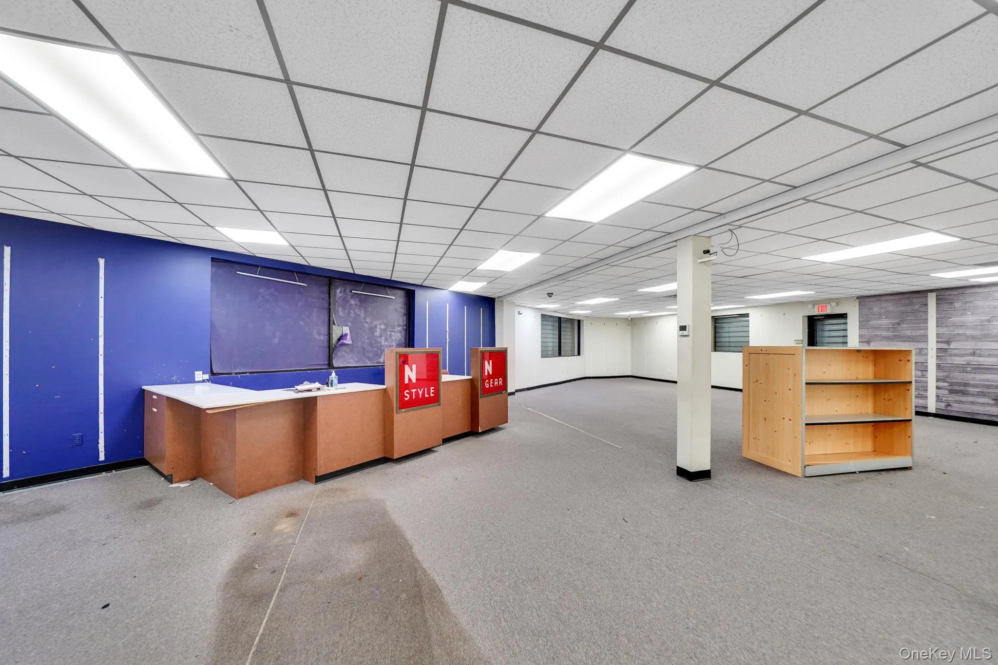 Bar featuring a paneled ceiling Bar featuring a paneled ceiling