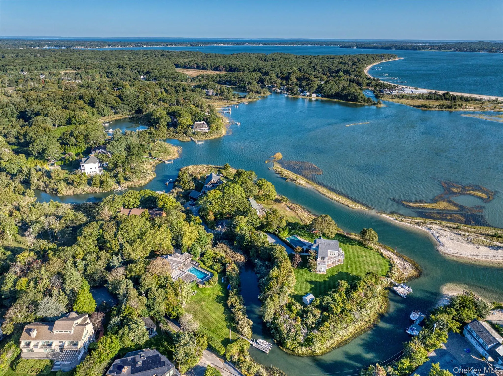 Aerial overview of property's location with a large body of water Aerial overview of property's location with a large body of water