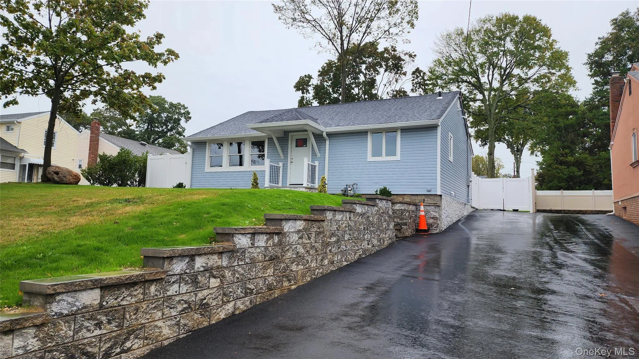 View of front of home with a shingled roof View of front of home with a shingled roof