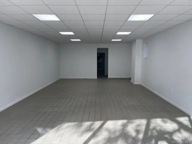 Spare room featuring a paneled ceiling Spare room featuring a paneled ceiling