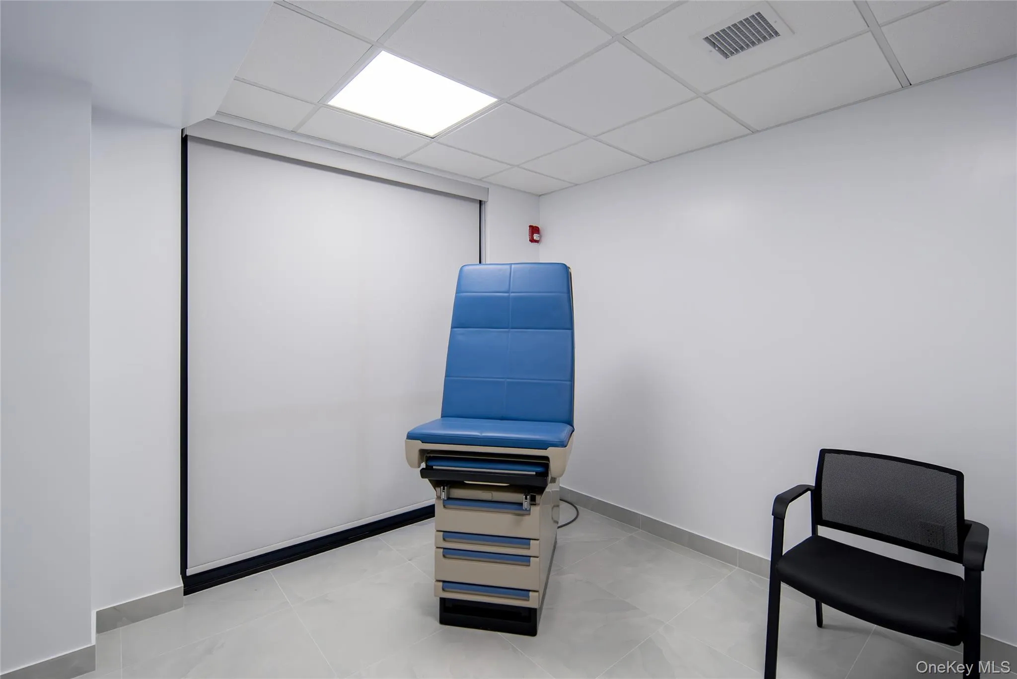 Miscellaneous room featuring a paneled ceiling Miscellaneous room featuring a paneled ceiling