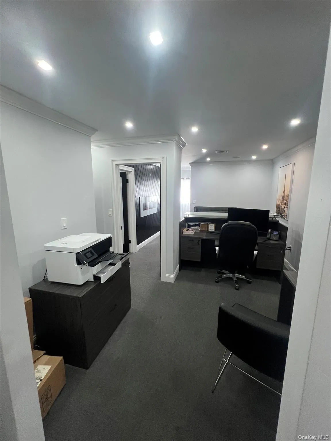 Office featuring ornamental molding, recessed lighting, and dark carpet Office featuring ornamental molding, recessed lighting, and dark carpet