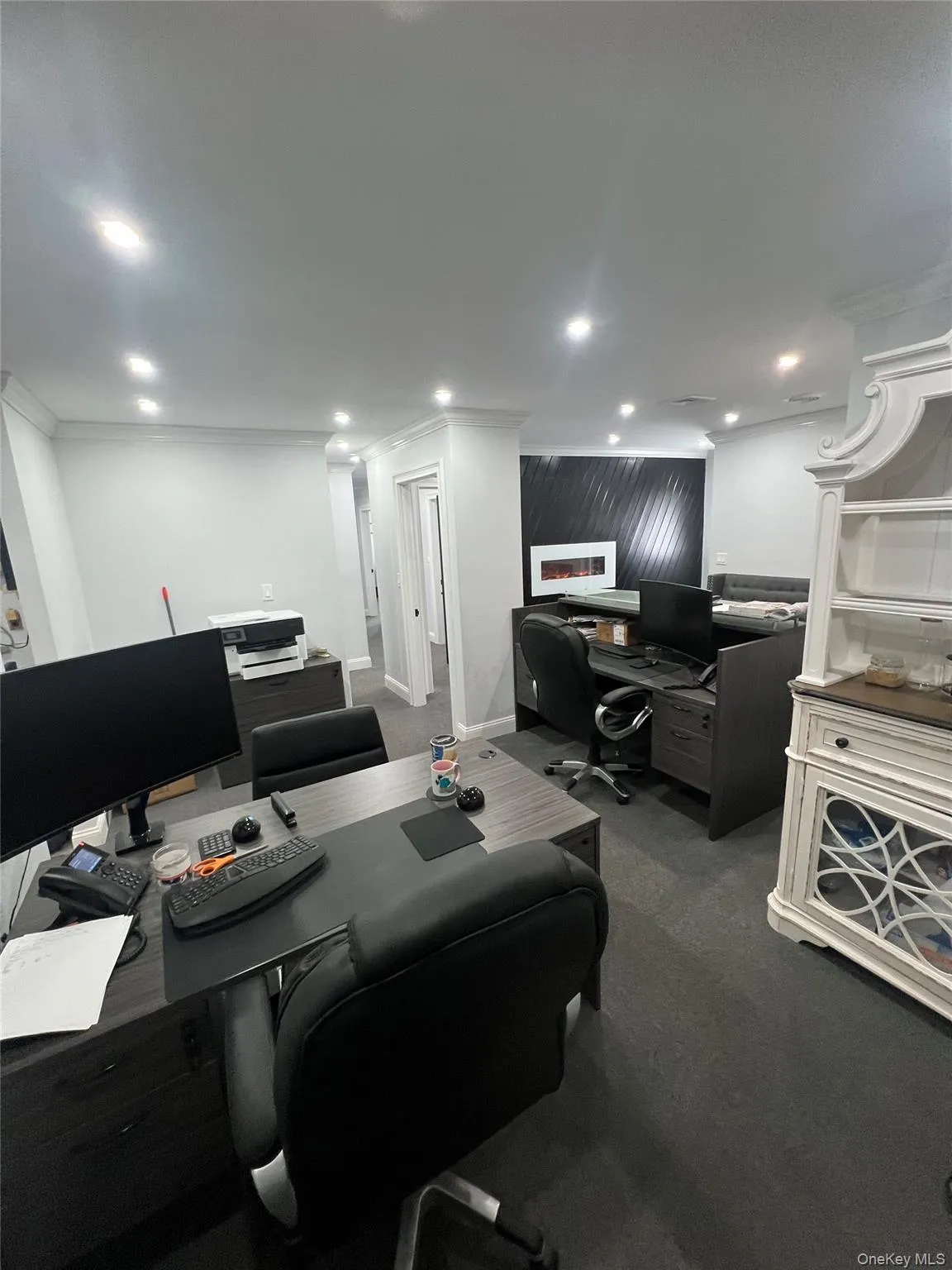 Office with crown molding, dark carpet, and recessed lighting Office with crown molding, dark carpet, and recessed lighting