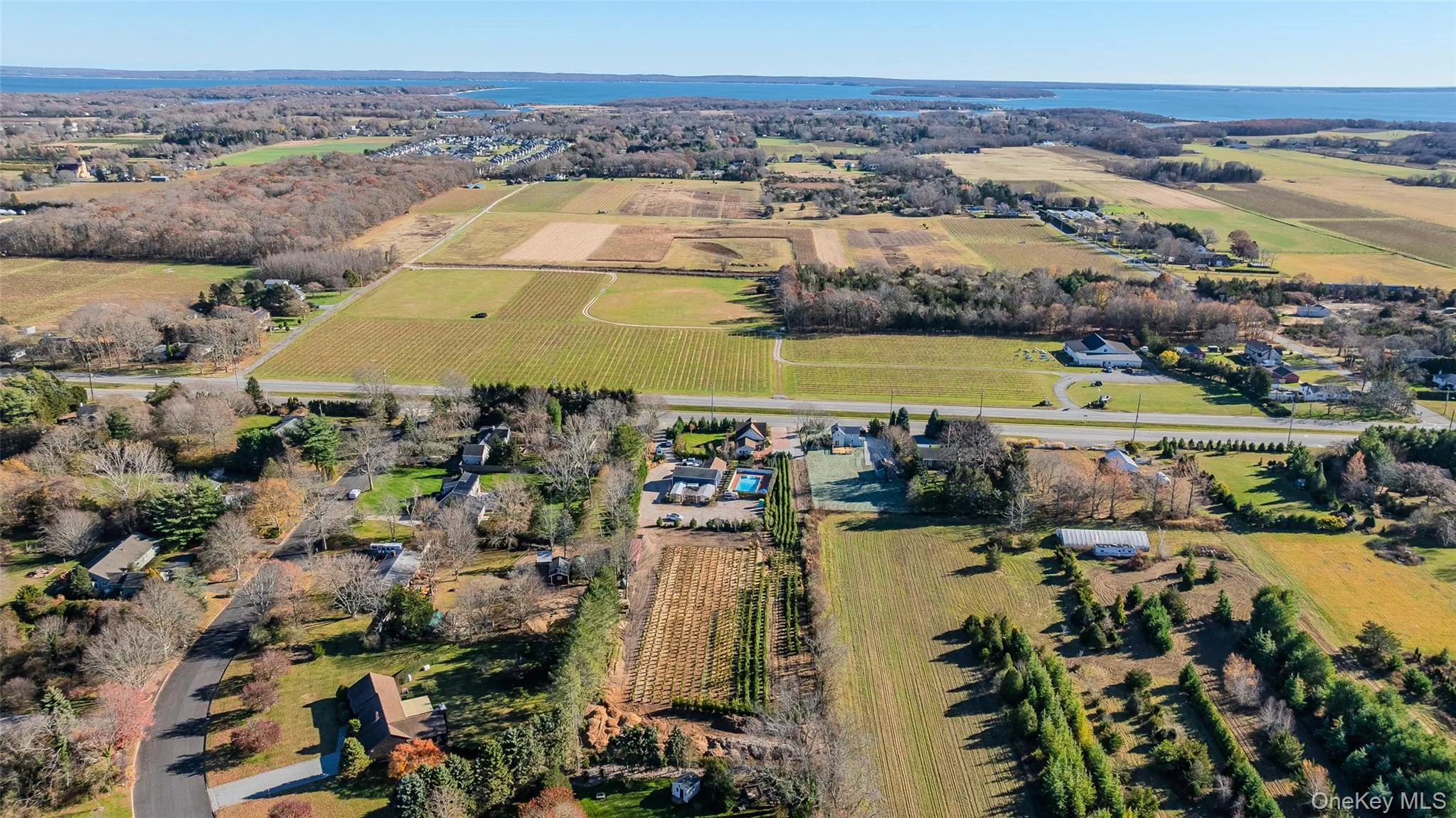 Aerial view of property's location featuring large plots for crops and rural landscape Aerial view of property's location featuring large plots for crops and rural landscape