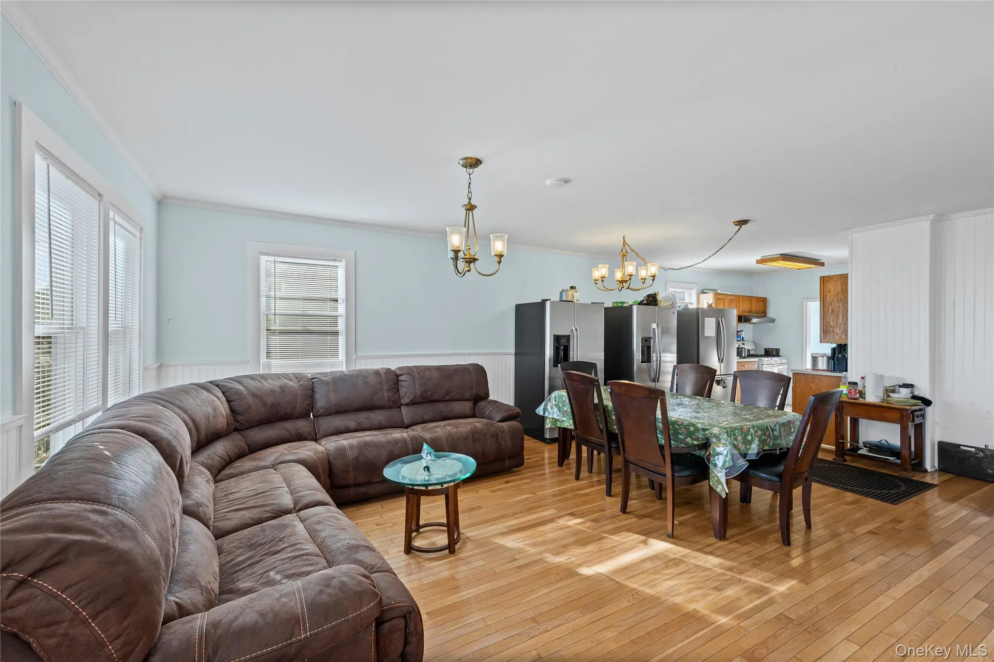 Living room/dining area featuring healthy amount of natural light Living room/dining area featuring healthy amount of natural light