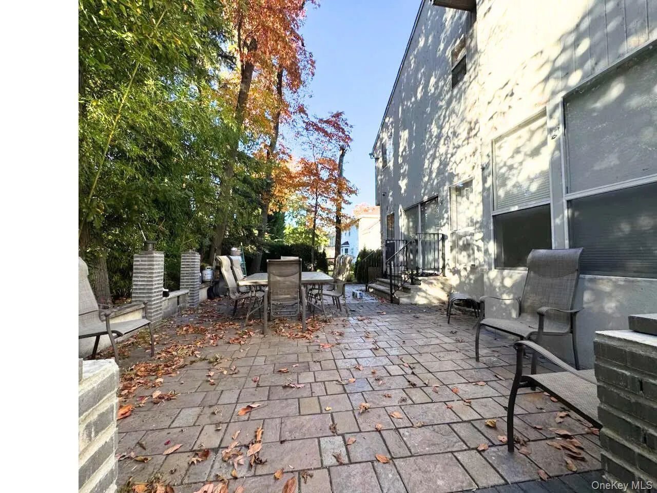 View of patio featuring outdoor dining space View of patio featuring outdoor dining space
