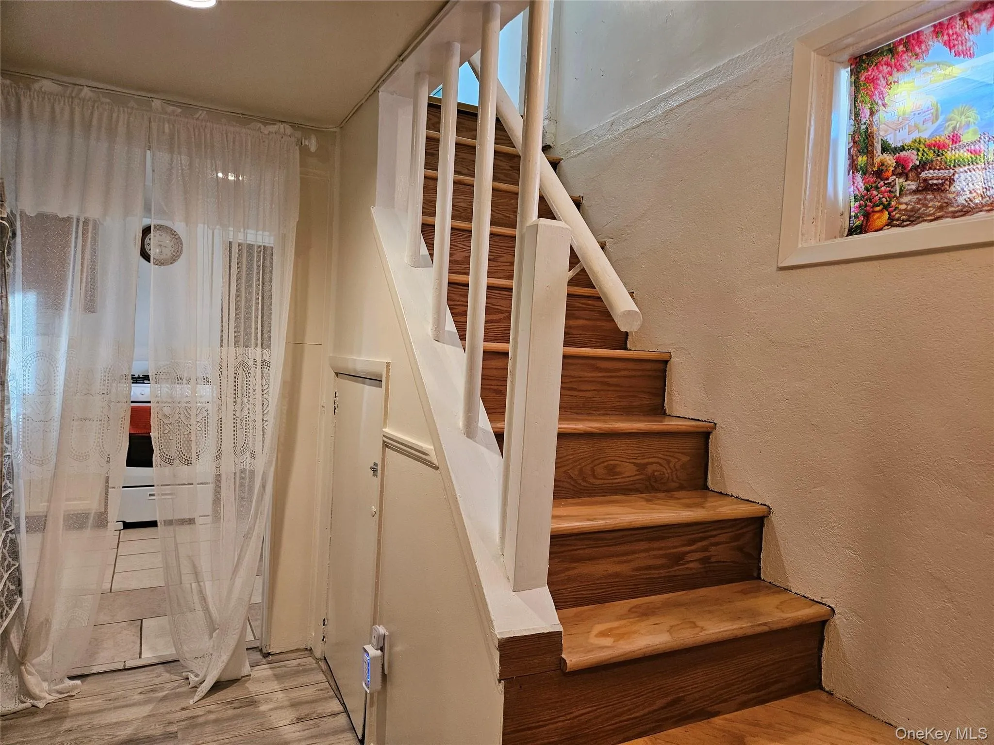 Stairs leading up to main floor of Apt 1 Stairs leading up to main floor of Apt 1