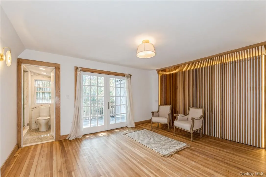 Bedroom with built-in wardrobe, access to bathroom and private balcony Bedroom with built-in wardrobe, access to bathroom and private balcony