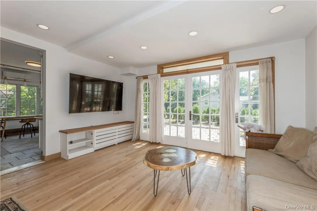 Family room with Frech doors leading to your large outside deck Family room with Frech doors leading to your large outside deck
