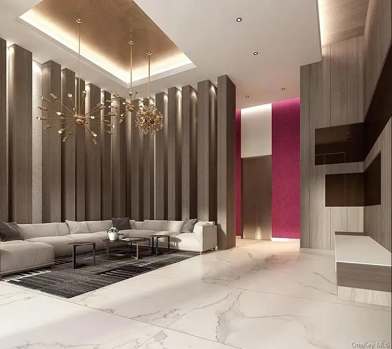 Lobby featuring wooden walls and a towering ceiling Lobby featuring wooden walls and a towering ceiling