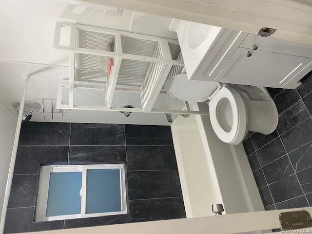 Bathroom featuring vanity and shower / washtub combination Bathroom featuring vanity and shower / washtub combination