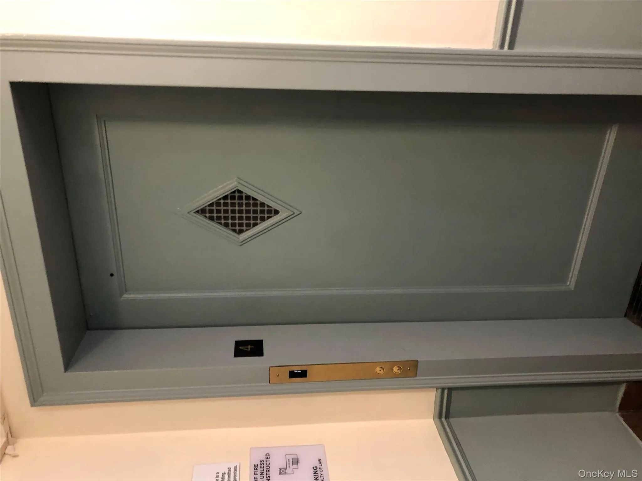 Detailed view of 4th floor elevator Detailed view of 4th floor elevator