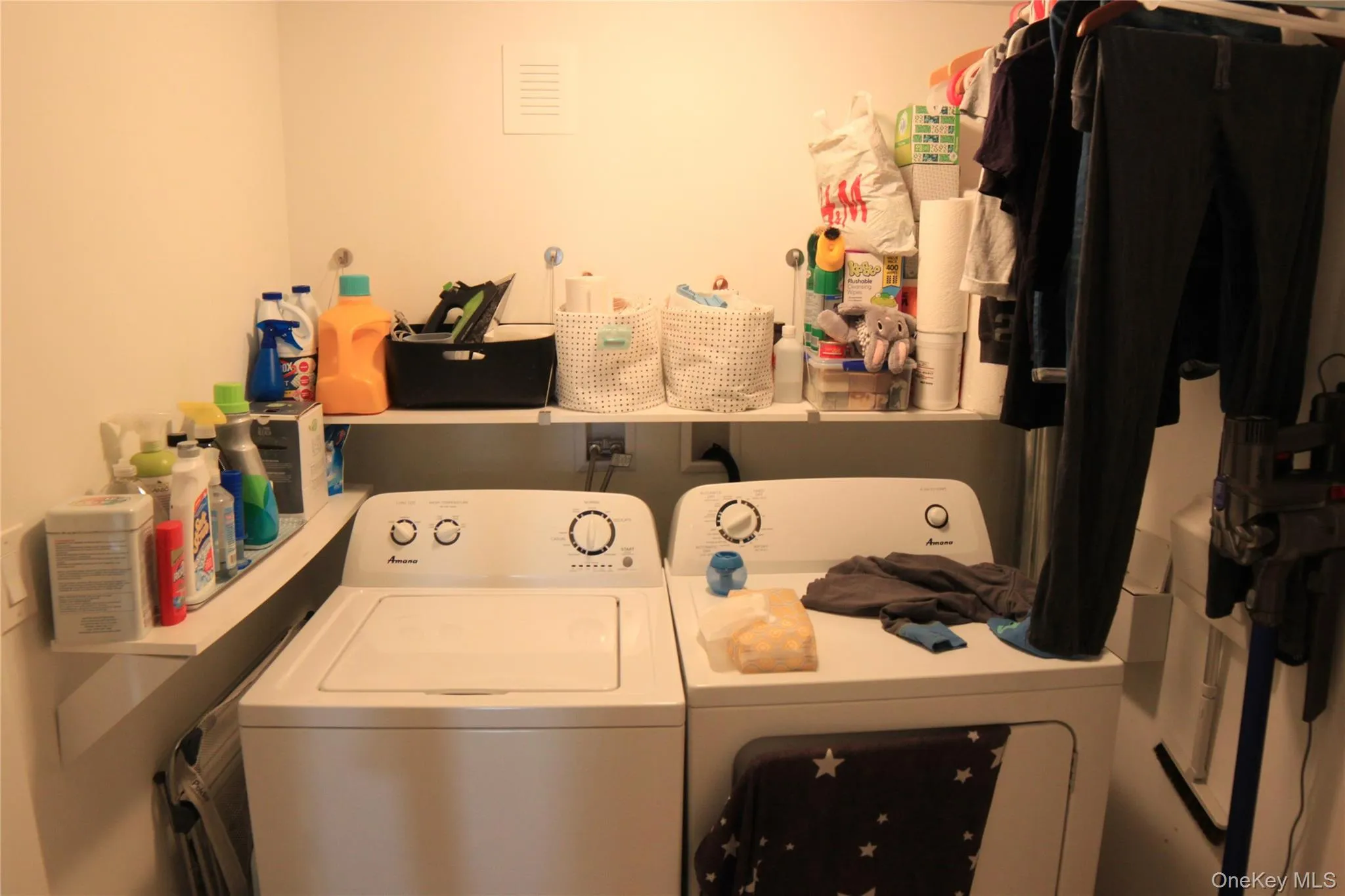 Laundry area featuring washing machine and dryer Laundry area featuring washing machine and dryer
