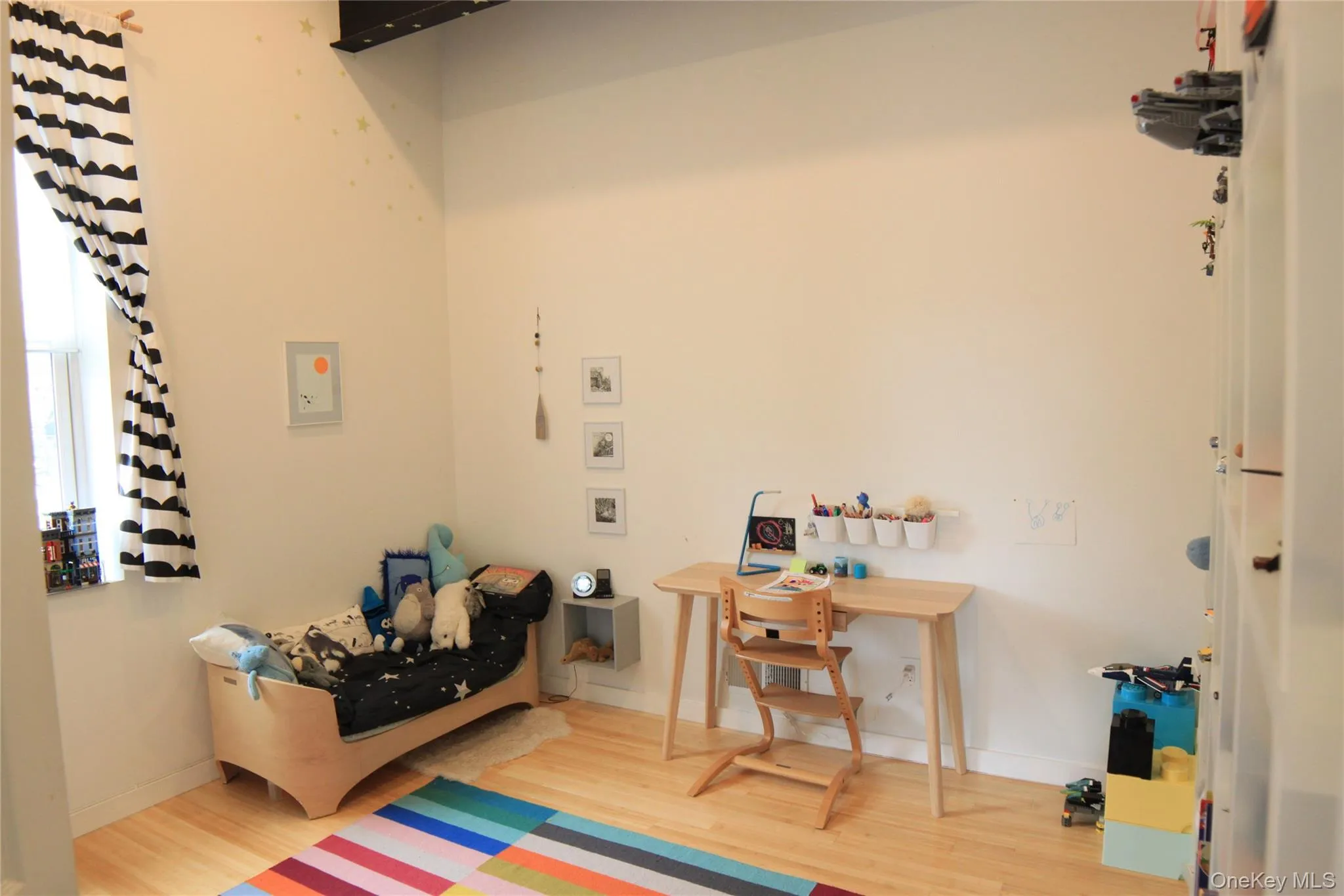 Home office featuring light wood-style flooring Home office featuring light wood-style flooring