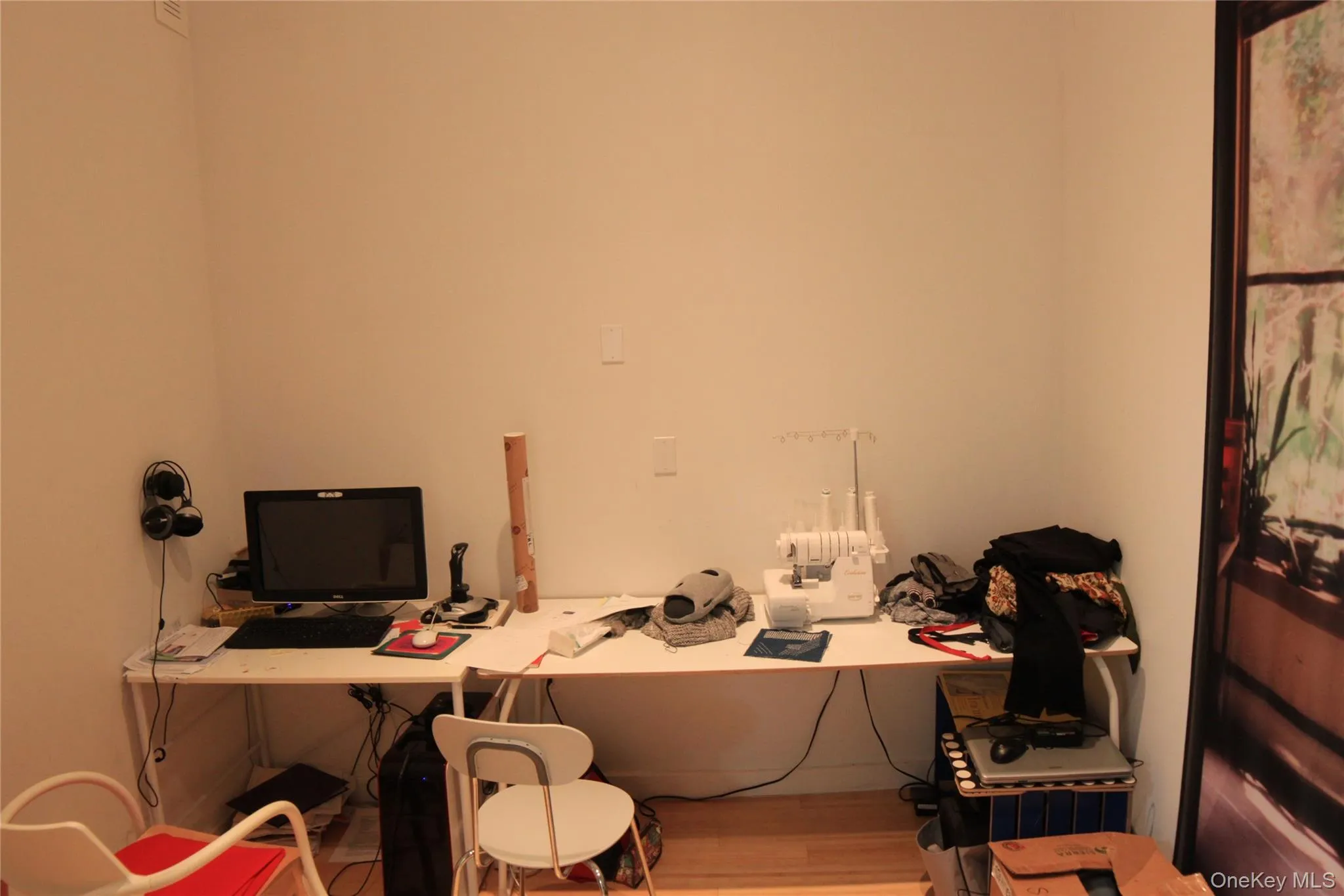 Office area featuring wood finished floors Office area featuring wood finished floors