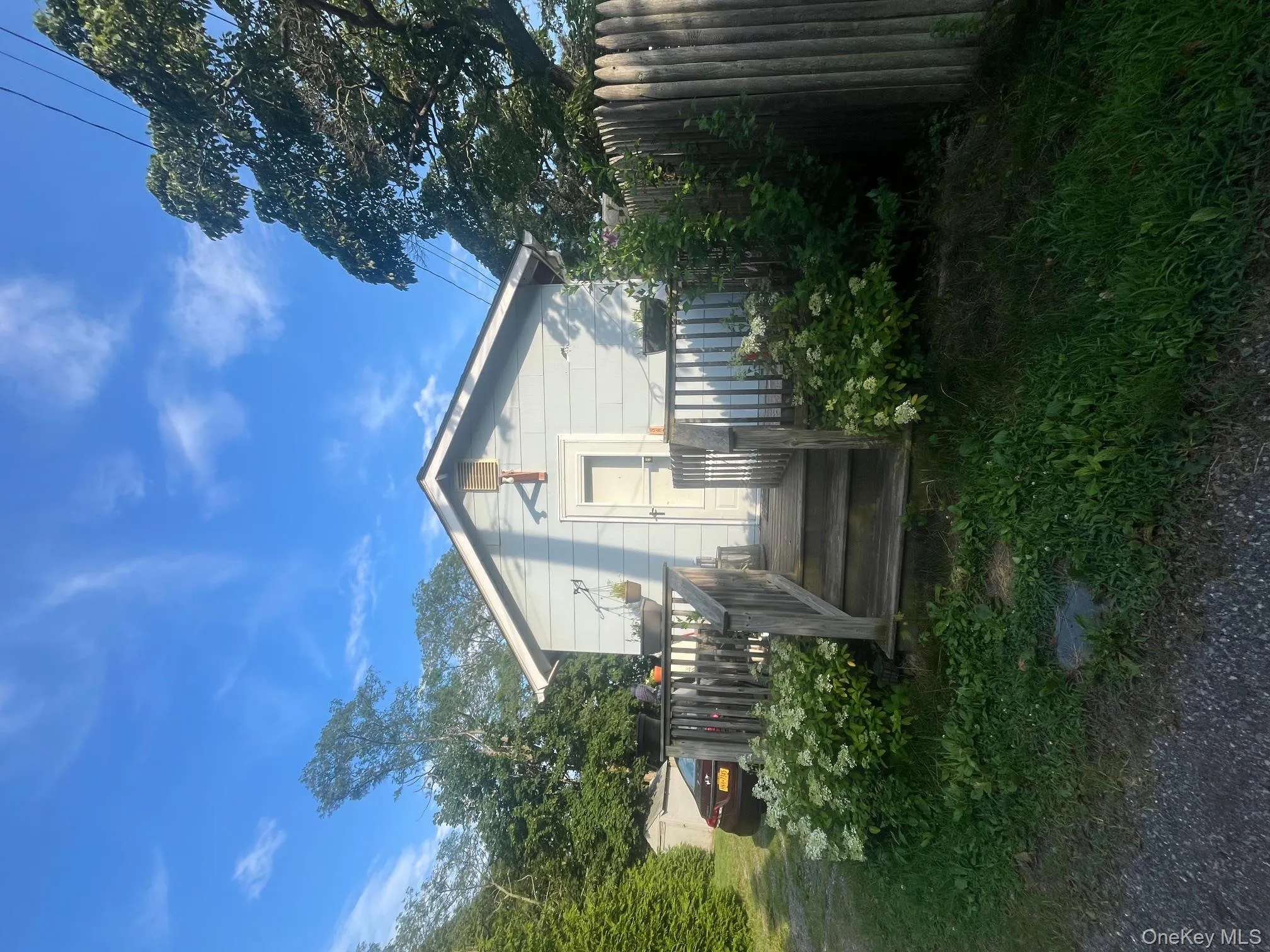 Back of property featuring a deck Back of property featuring a deck