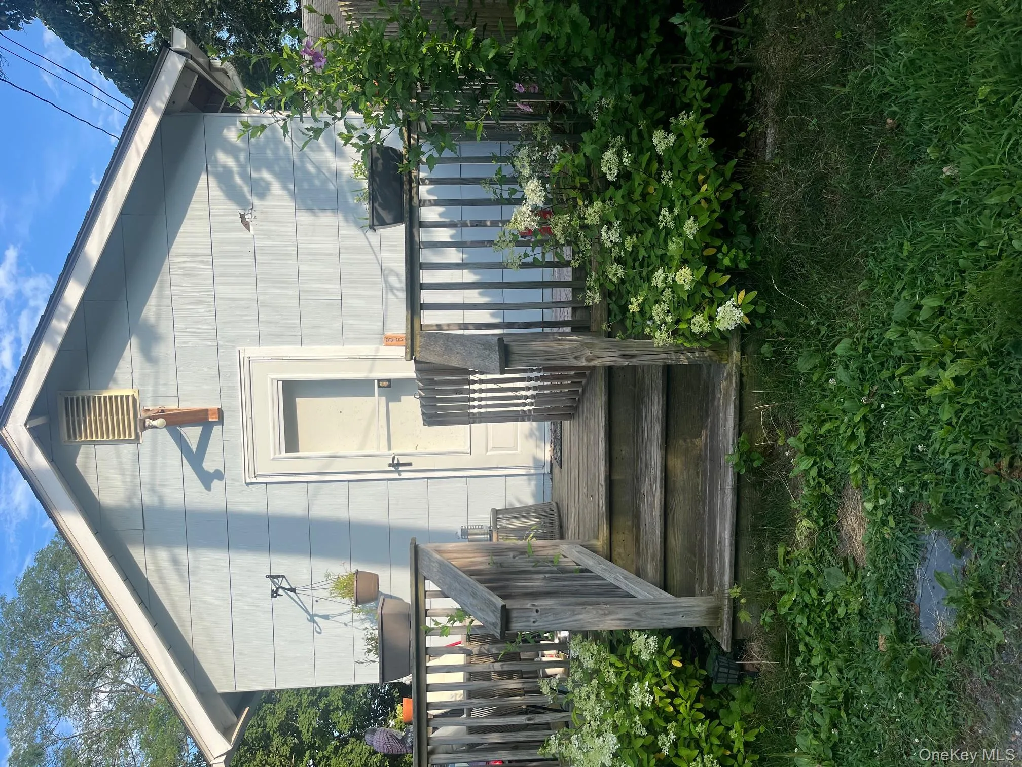 Property entrance featuring a deck Property entrance featuring a deck