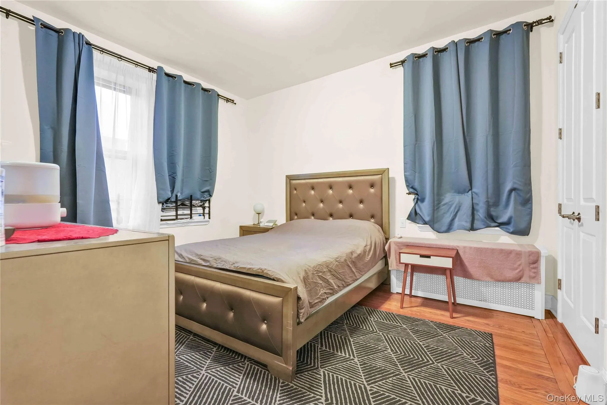 Bedroom with wood finished floors Bedroom with wood finished floors