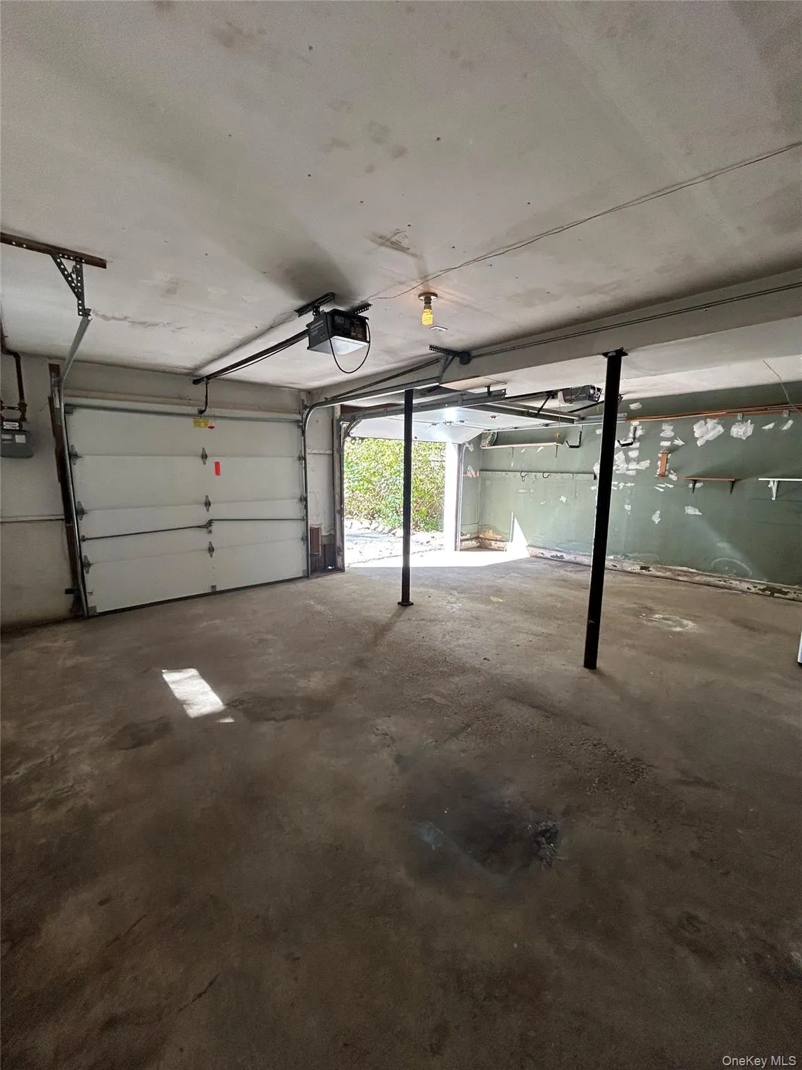 Garage with a garage door opener Garage with a garage door opener