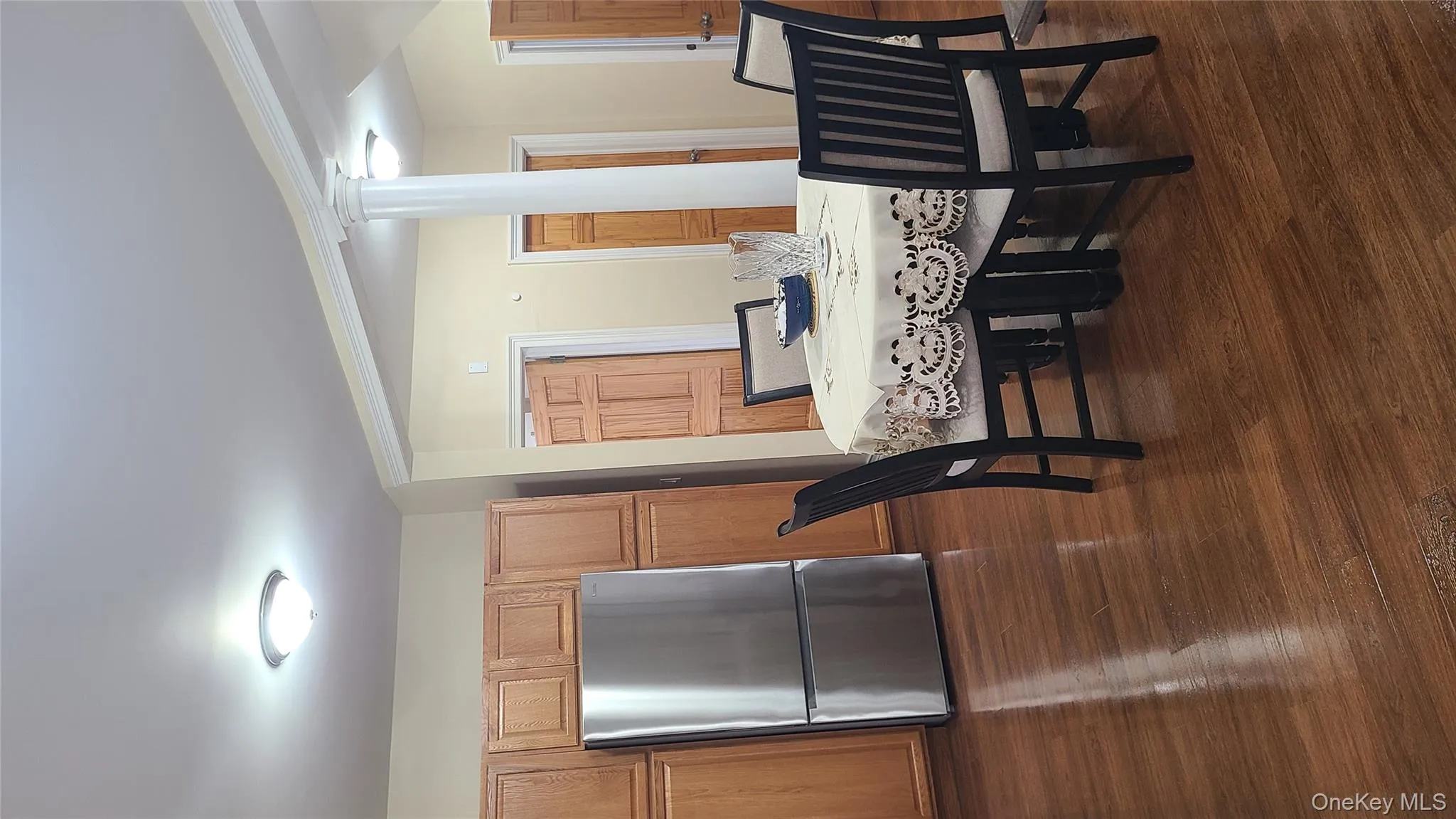 Dining room with dark wood finished floors Dining room with dark wood finished floors