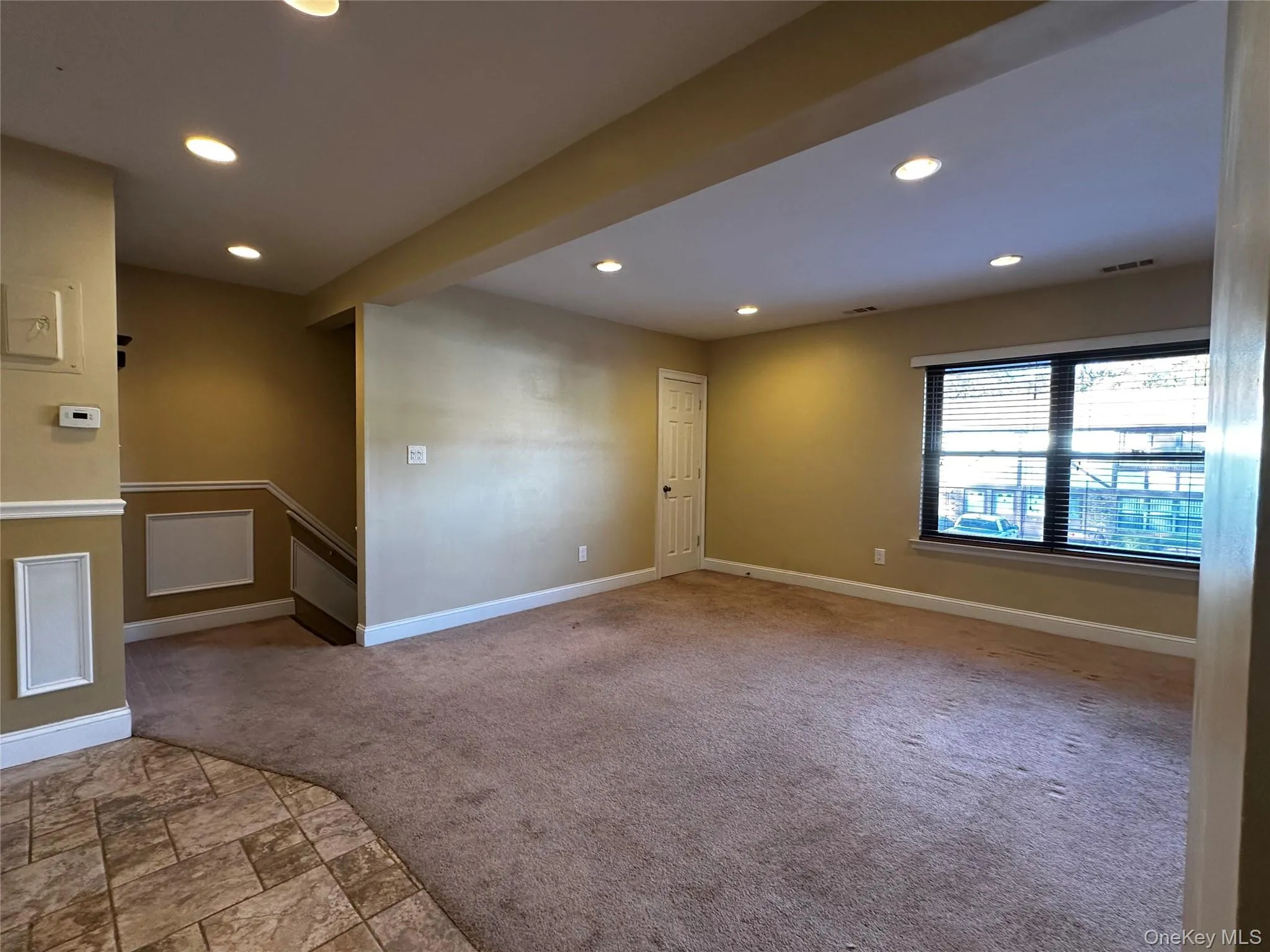 Large living room with recessed lighting Large living room with recessed lighting