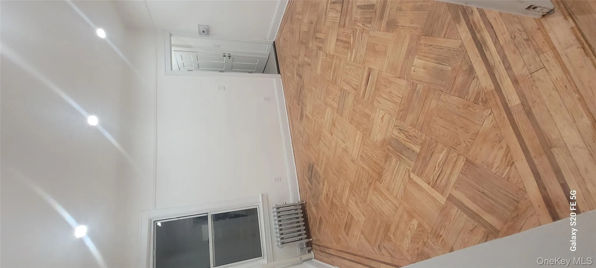 Spare room with radiator and recessed lighting Spare room with radiator and recessed lighting