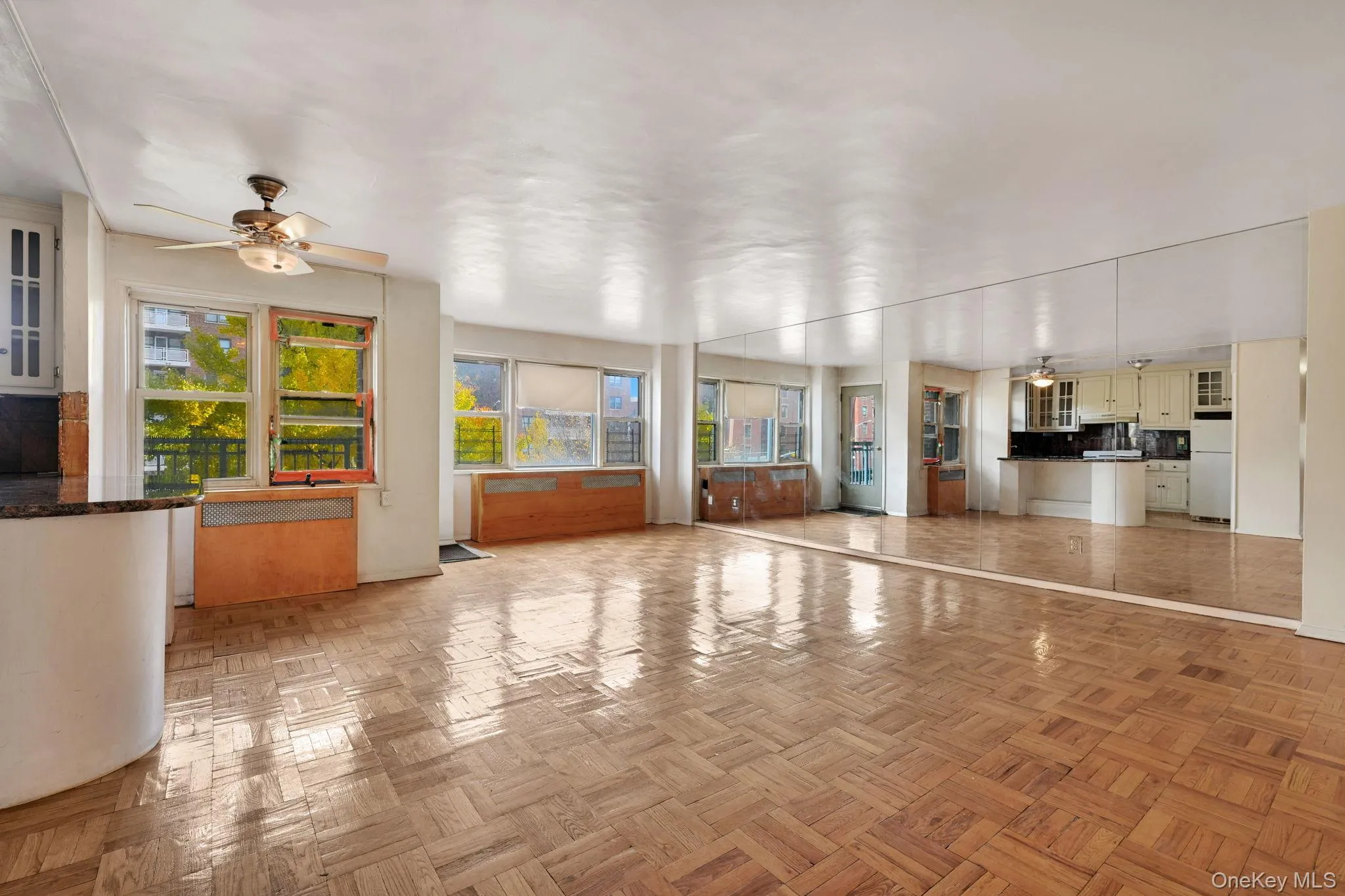Unfurnished living room with ceiling fan Unfurnished living room with ceiling fan