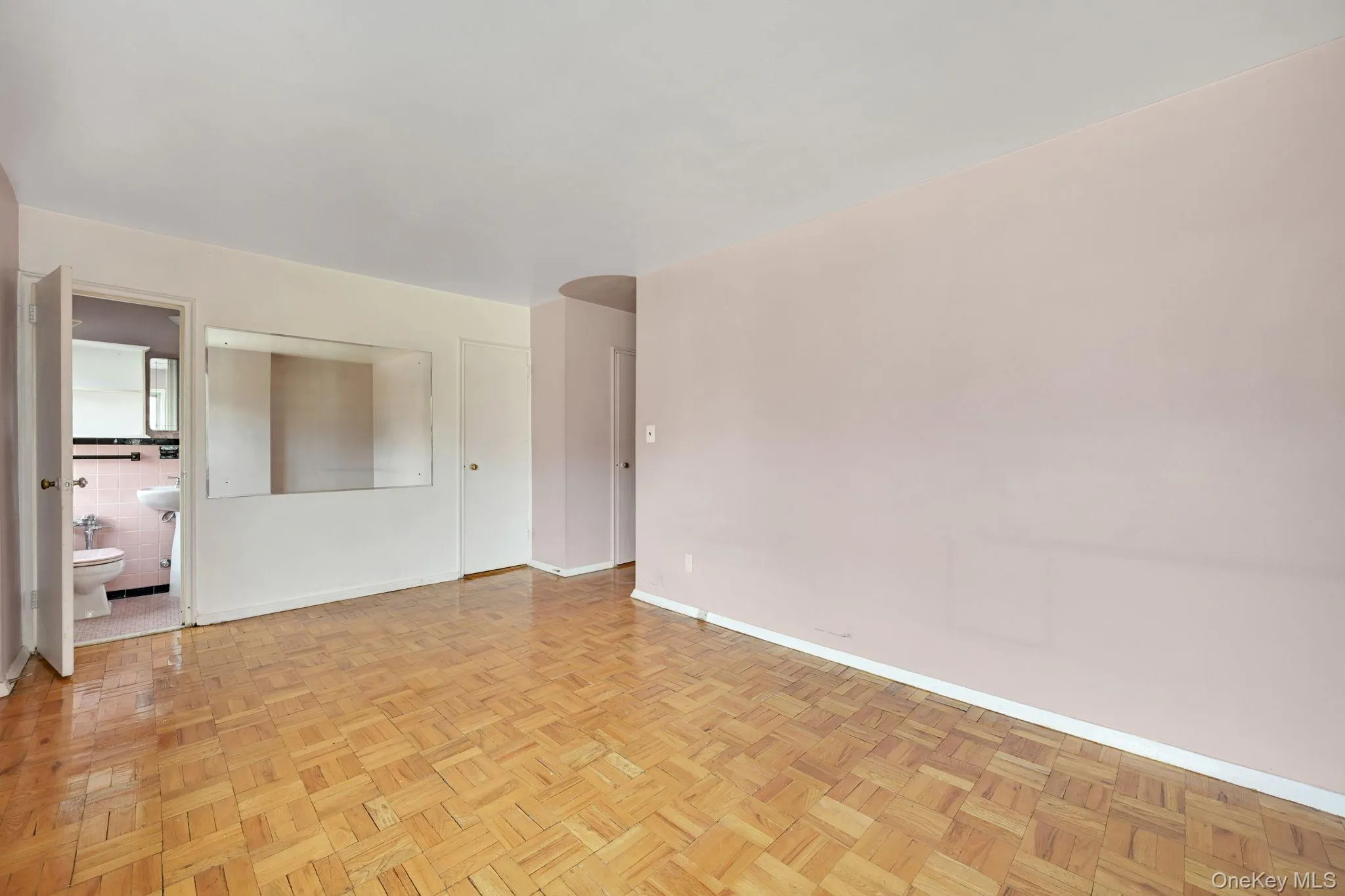 Empty room with baseboards Empty room with baseboards