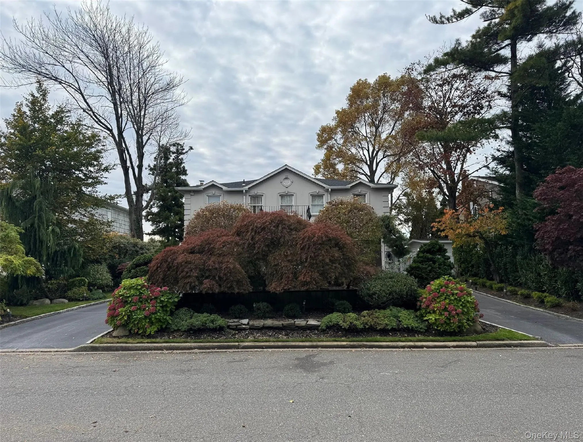 View of front of property featuring a balcony View of front of property featuring a balcony