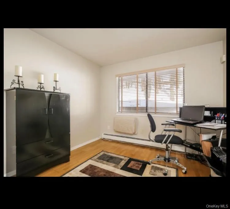 Second Bedroom could be used as an office with hardwood Floors Second Bedroom could be used as an office with hardwood Floors