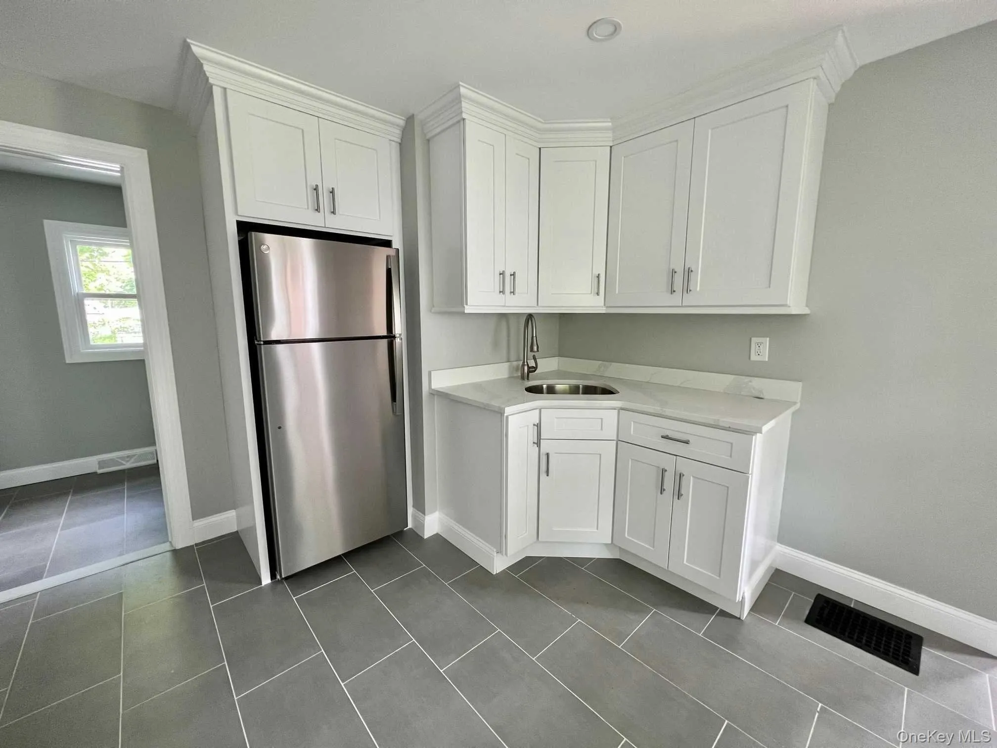 Kitchen with tile floor Kitchen with tile floor