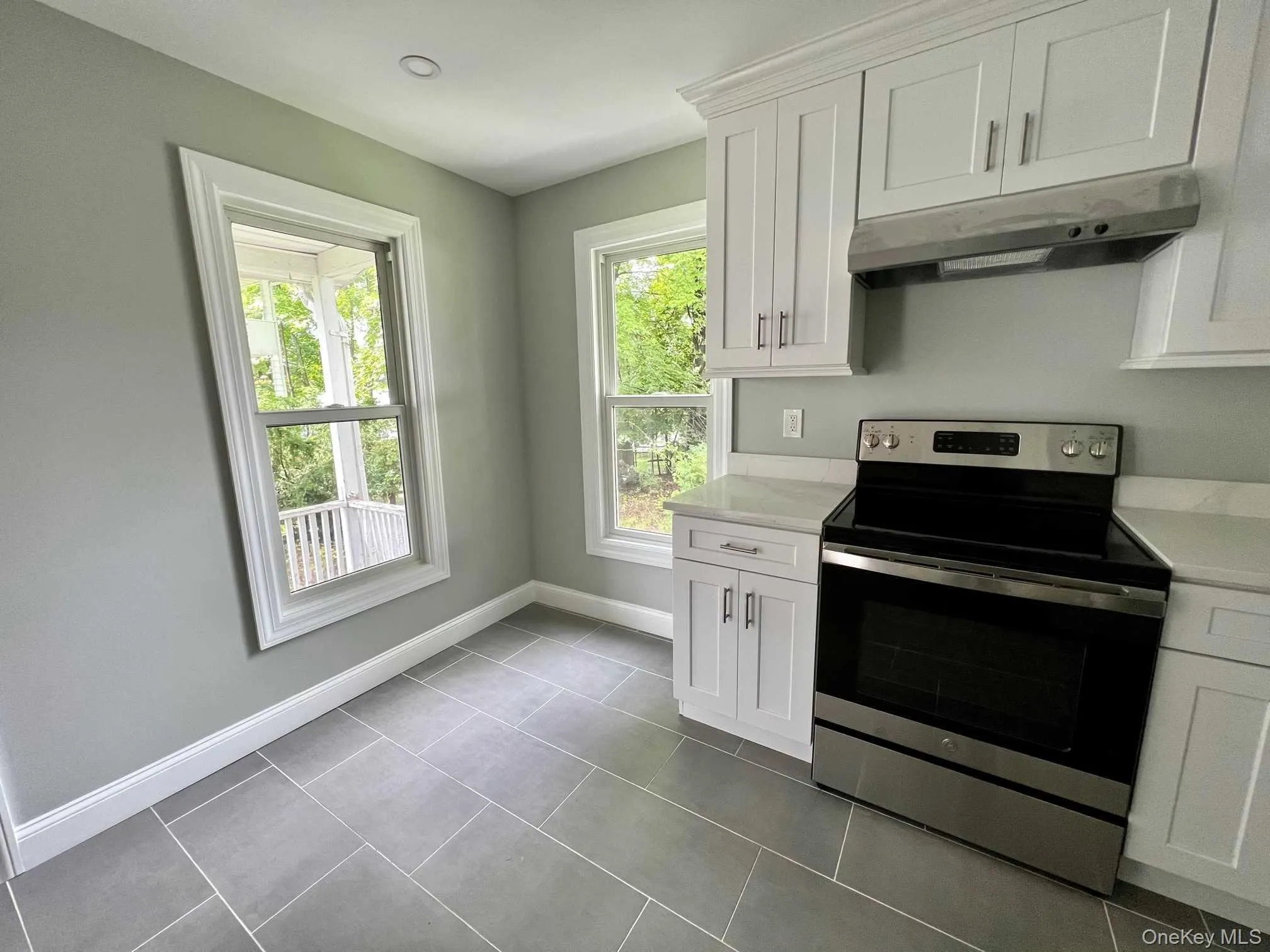 Corner windows in kitchen, perfect spot for a small table Corner windows in kitchen, perfect spot for a small table