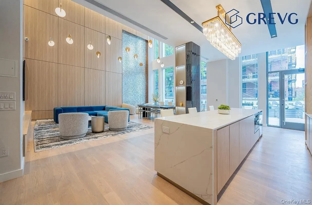 Building lobby with floor to ceiling windows Building lobby with floor to ceiling windows