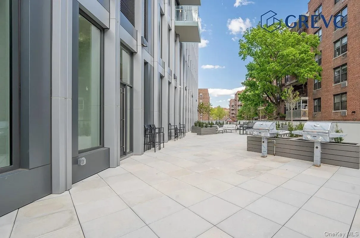 View of community featuring a patio area View of community featuring a patio area