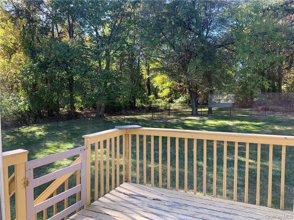 Deck with a yard Deck with a yard