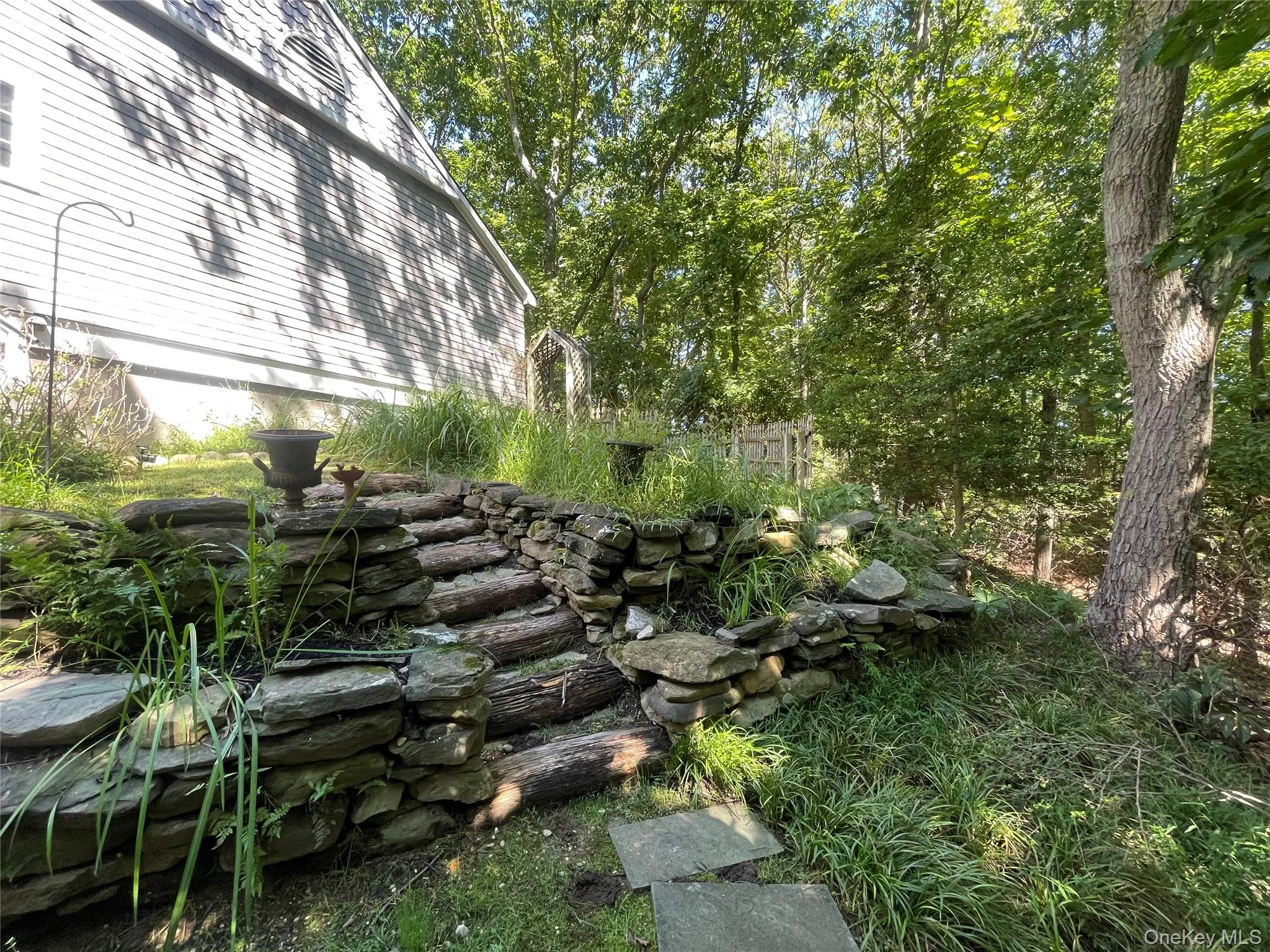 View of yard featuring a garden pond View of yard featuring a garden pond
