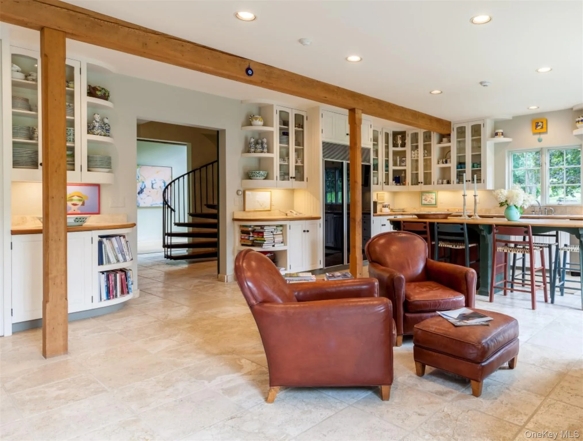 Living room with wet bar, beam ceiling, recessed lighting, and stairs Living room with wet bar, beam ceiling, recessed lighting, and stairs