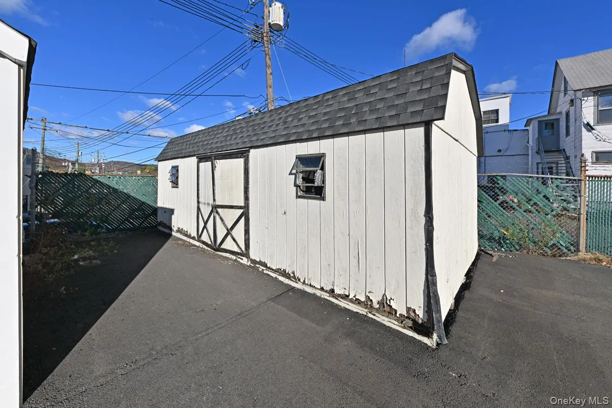 View of shed with a fenced backyard View of shed with a fenced backyard