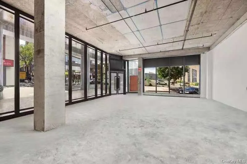 Empty room with concrete flooring Empty room with concrete flooring