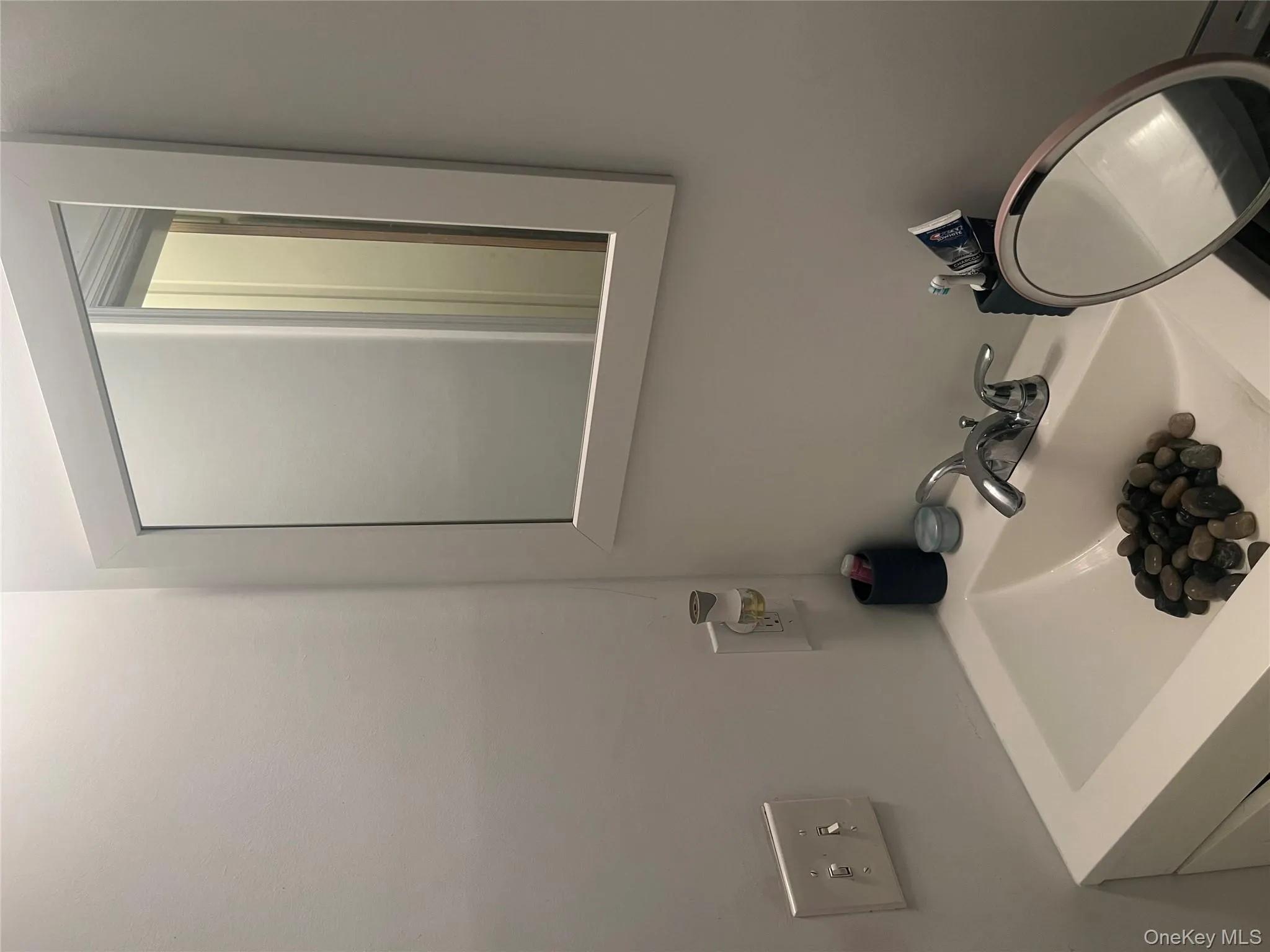 Bathroom featuring vanity Bathroom featuring vanity