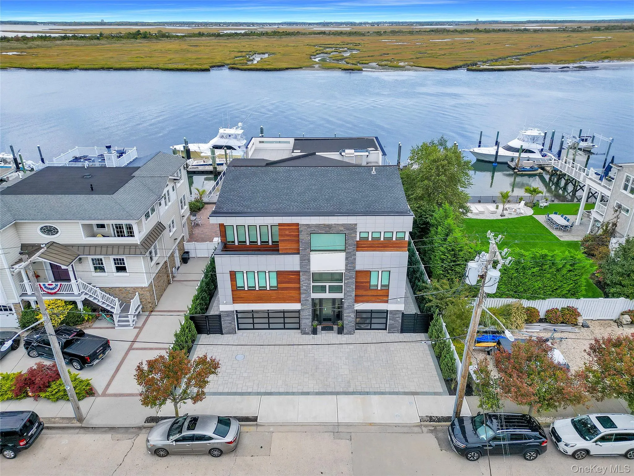 Aerial view of residential area featuring a Reynolds Channel Frontage. Aerial view of residential area featuring a Reynolds Channel Frontage.